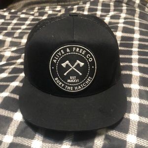 Alive and free co. Snap back in black